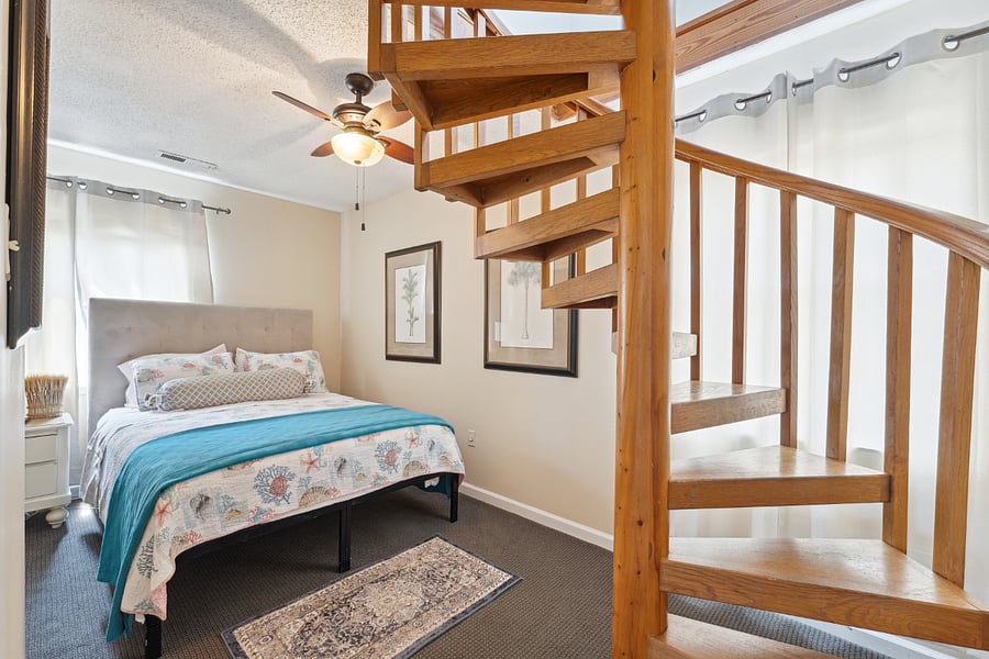 First Floor Queen bedroom with access staircase to the Loft bedroom