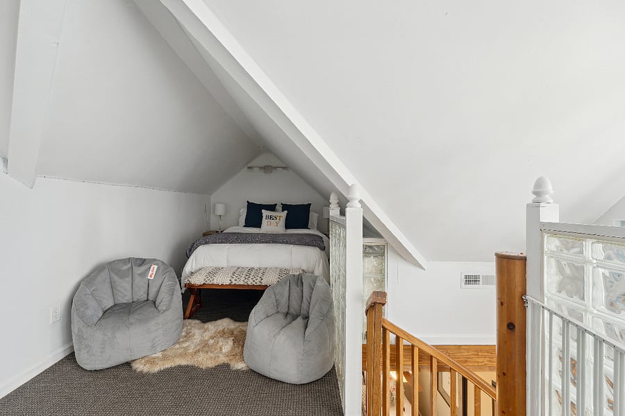 Loft with Queen bed, also has a twin bed on the other side of the room. This loft is located on the top floor (3rd floor)