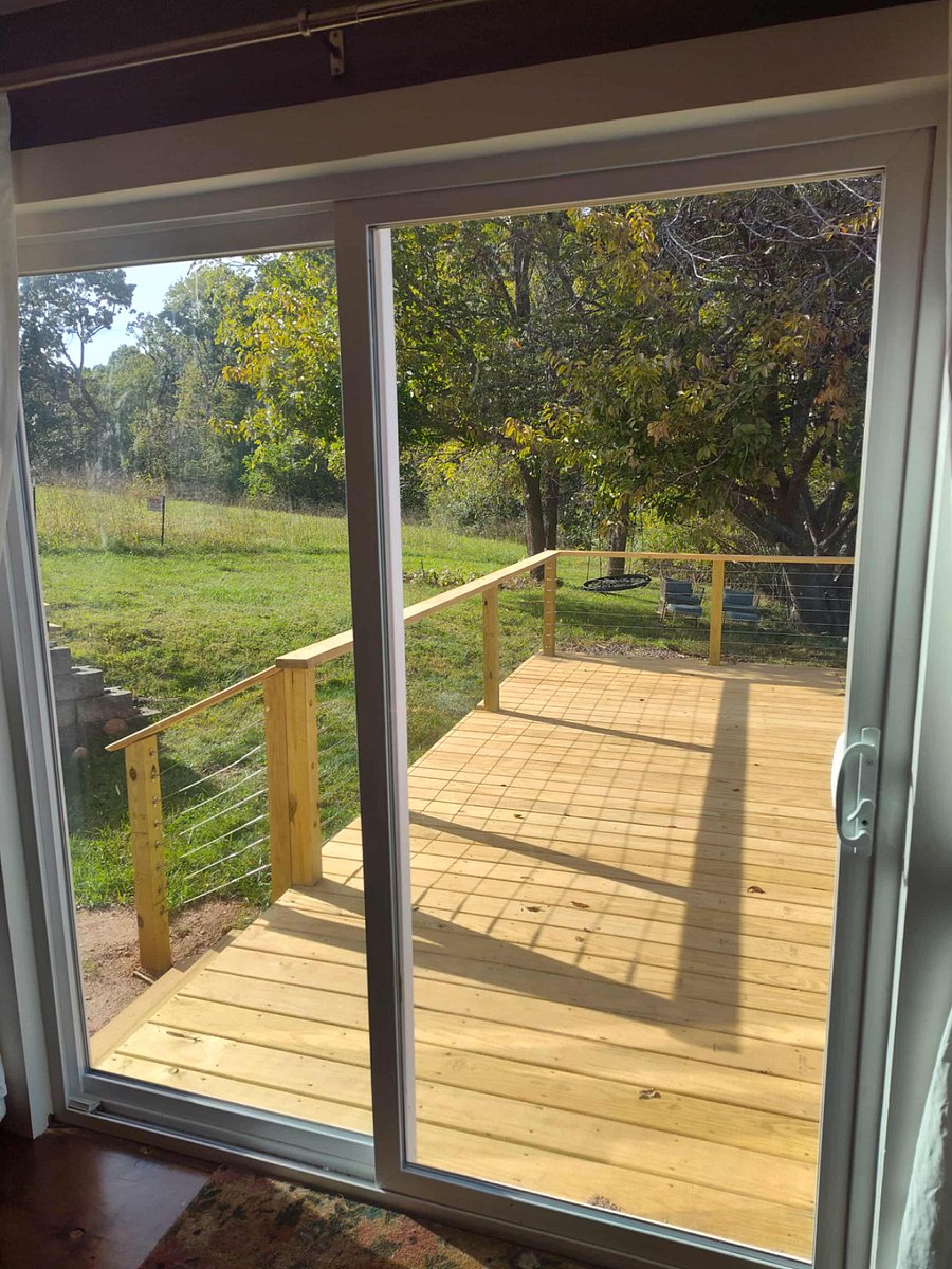 New Deck through Sliding Glass door in living room.