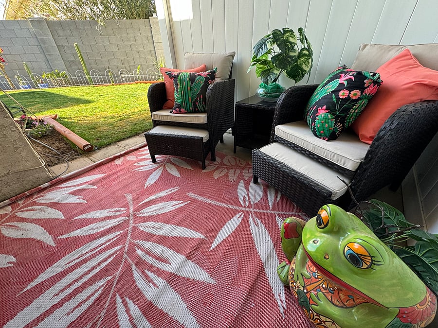 Outside patio to Master bedroom with lawn in background.