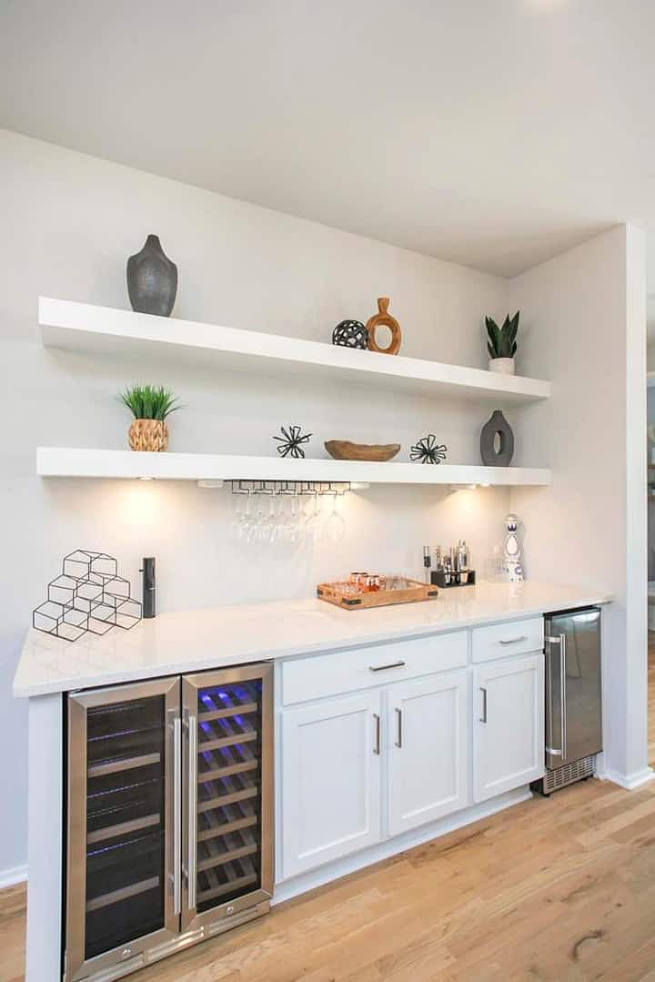 Wet bar with icemaker and wine fridge
