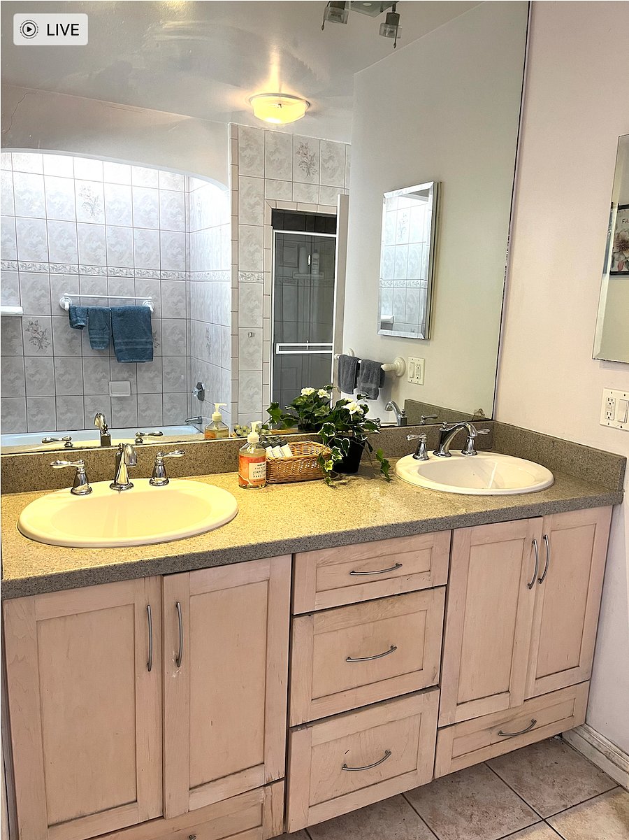 Double sink bath with ample storage.