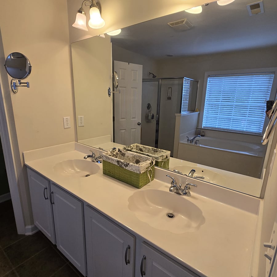 Master Bath with double sink, bathtub, walk-in shower.