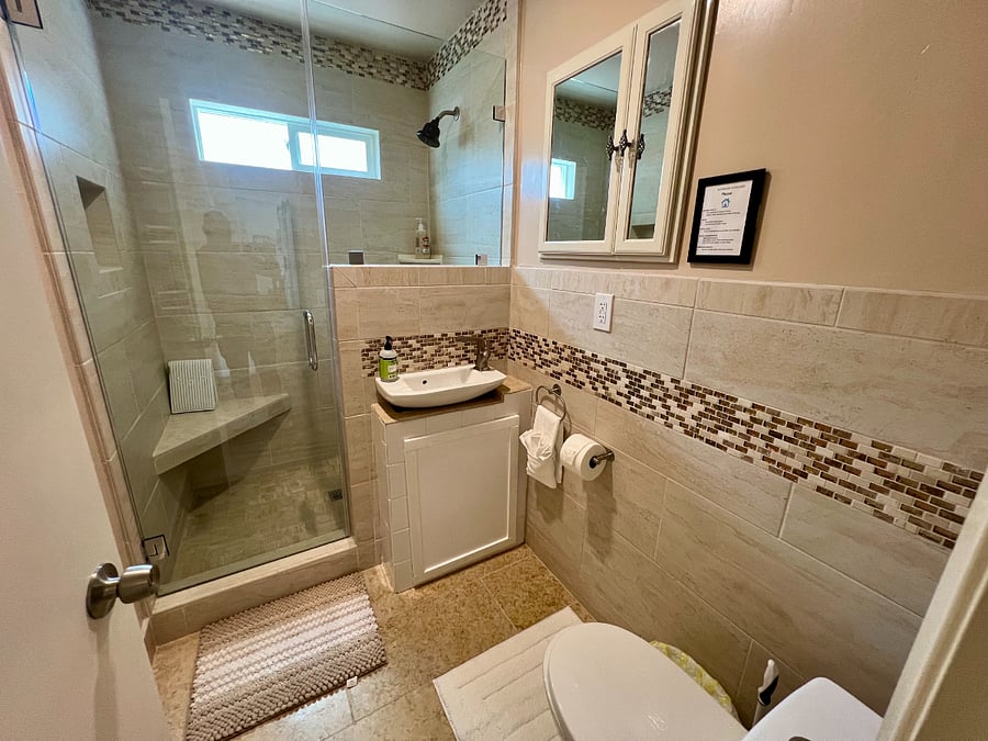 The hall bathroom with a large walk-in shower.