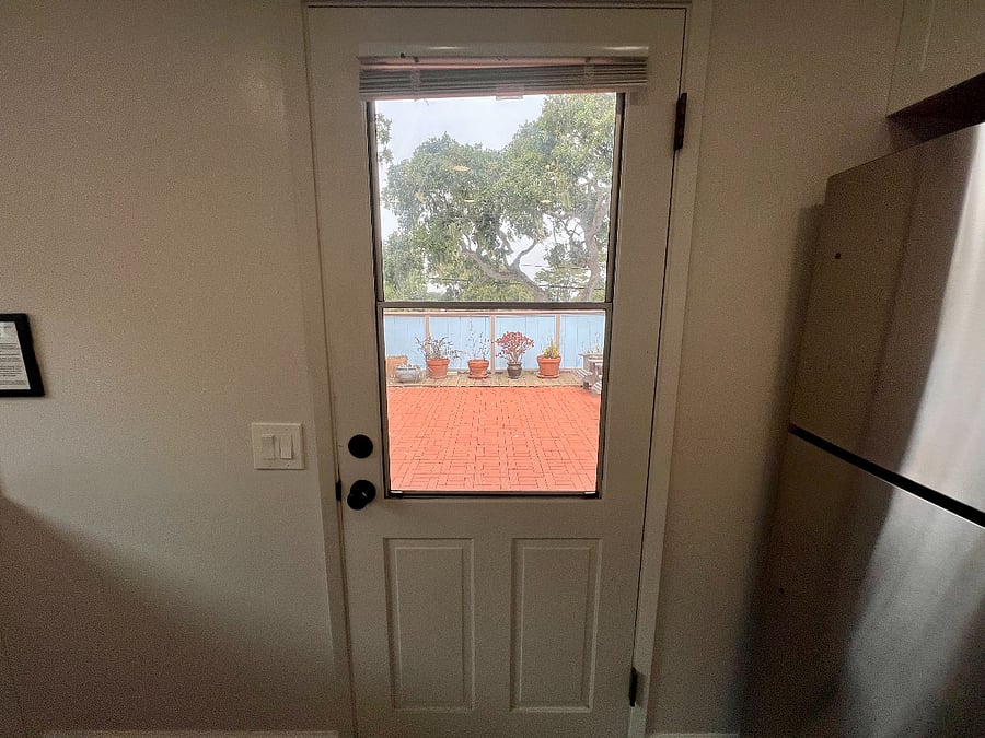 The view of the front balcony from the kitchen.