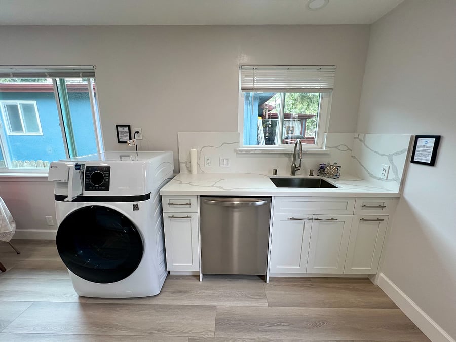 All NEW kitchen with dishwasher, disposal, stainless steel sink with pulldown faucet, and washer/dryer combo.
