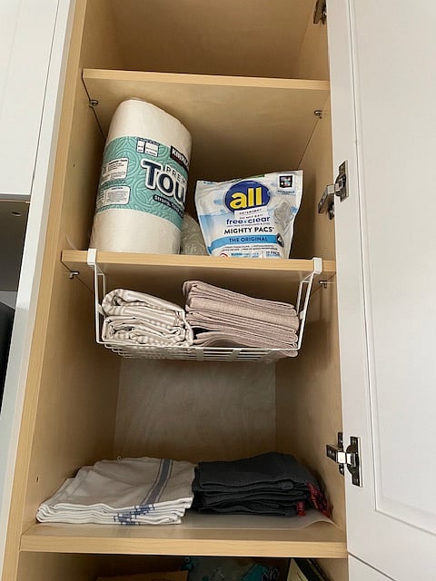 Placemats, tablecloth, starter supply of dishwashing pods and paper towels.