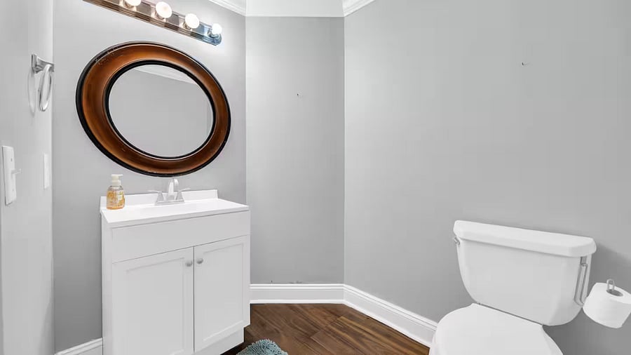 1/2 bath within entertainment space (bar area) on first floor