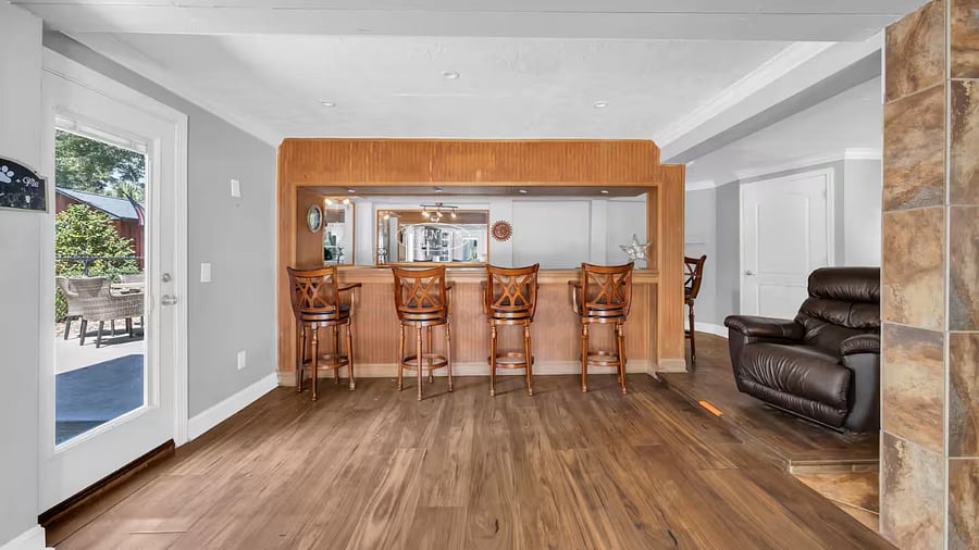 Entertain with a full bar, refrigerator, steps away from outdoor entertainment (Firepit, seating, outdoor shower, grills, outdoor kitchen)