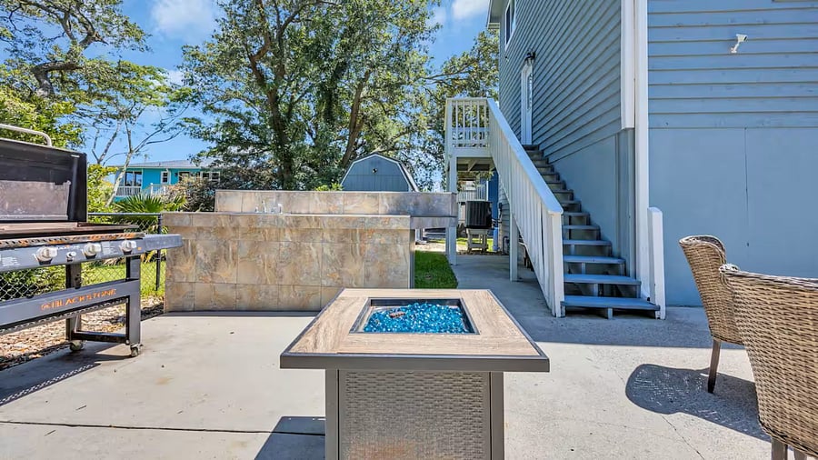 Outdoor entertainment includes: firepit, outdoor lights, grills, and outdoor kitchen.