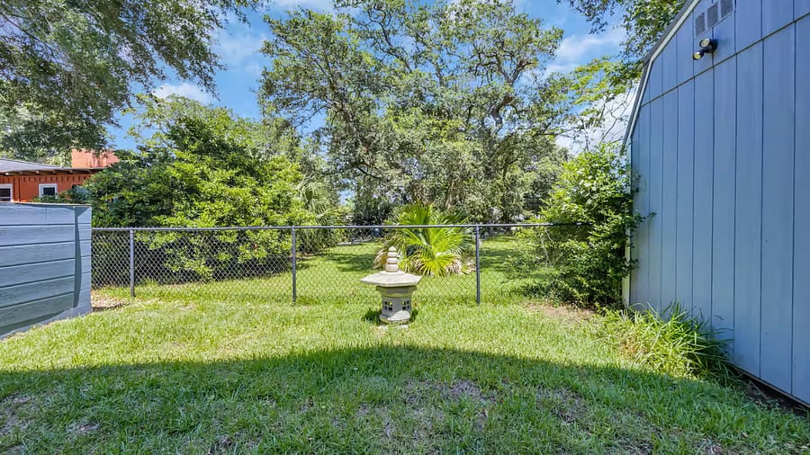 small Glimpse of fenced in backyard