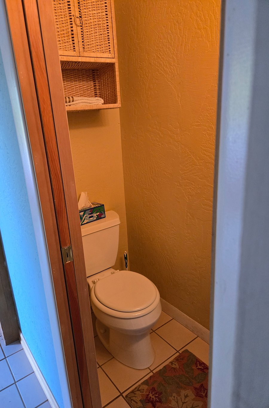 Half Bath between bedrooms and utility.