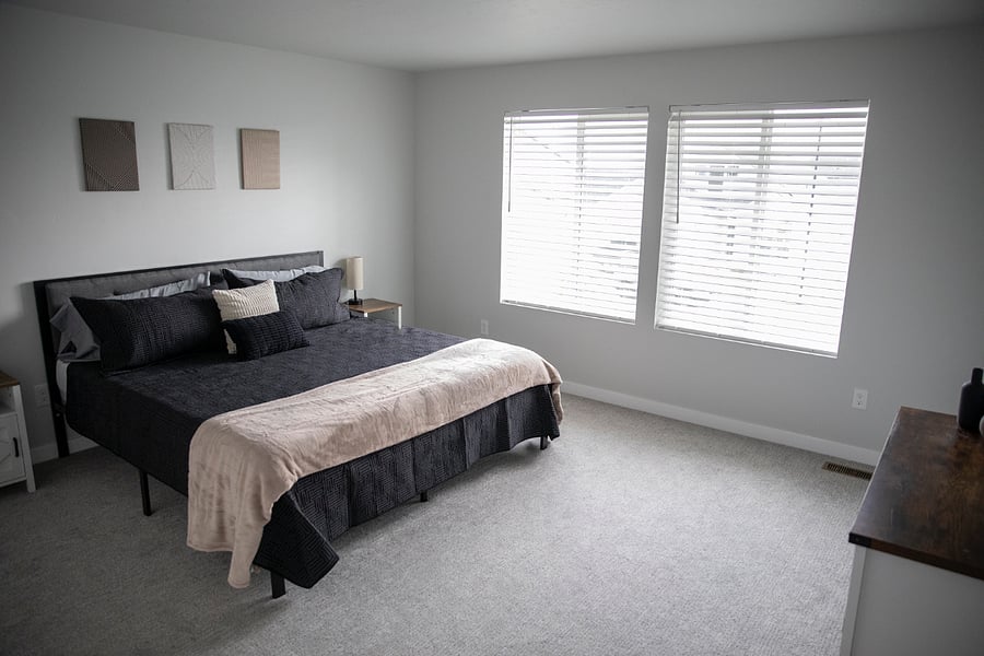Master bedroom with king bed, 55 inch tv, pack and play w/sheets and mattress in closet along with mama roo baby swing ! We added black out curtains (need to update photo) looks the same otherwise ! 
