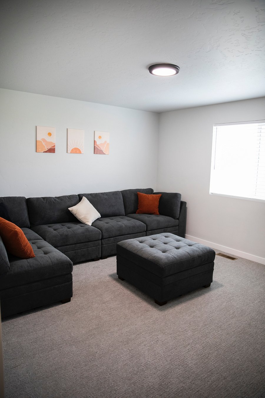 Upstairs loft extra living room with a 55 inch TV and a small dresser that has games :) 