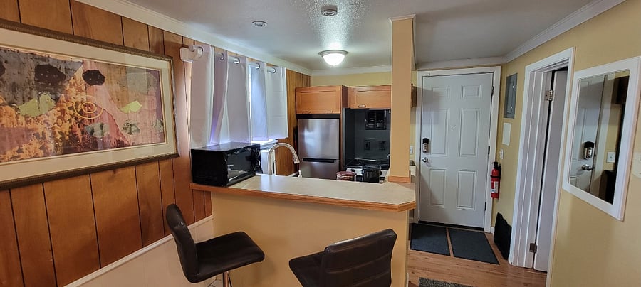 View from sitting area to Kitchen