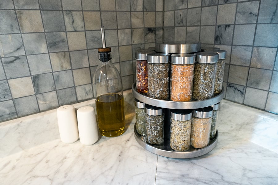 Spices, olive oil and salt & pepper for cooking meals at home