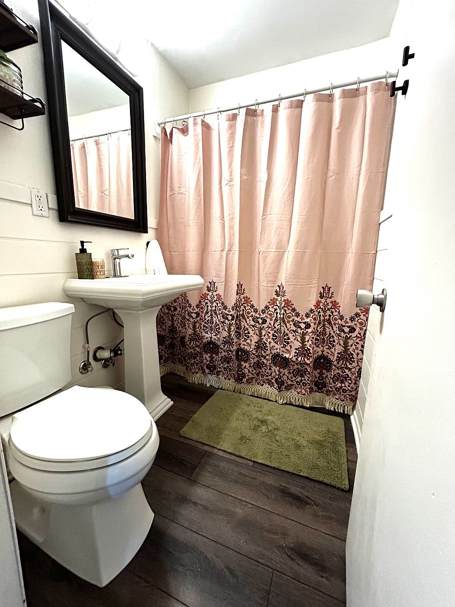 Full bath with tub/shower combo and starter shampoo, conditioner & body wash