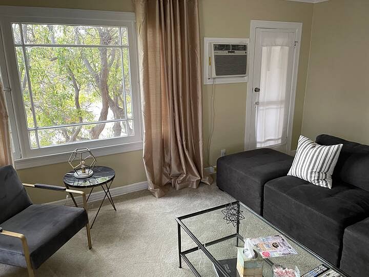 Living Room with Wall Air Conditioner