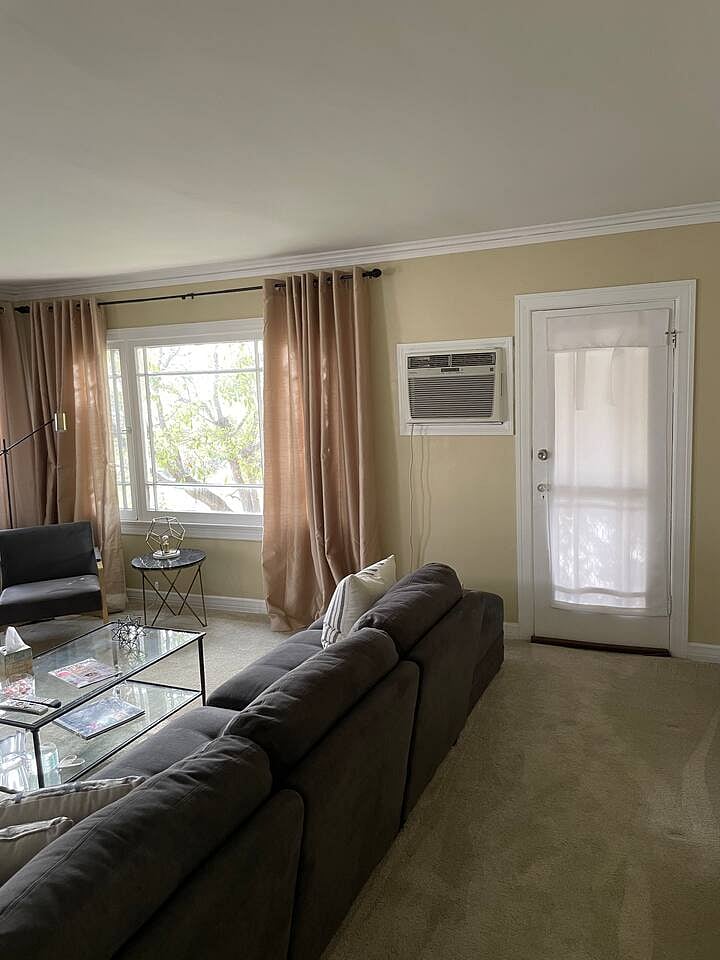 Living Room with Wall Air Conditioner