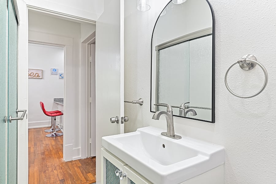 One Bathroom Upstairs and the Second Bathroom is Downstairs in the Studio Apartment