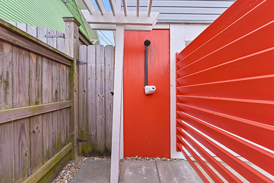 Rinse off the sand and salt in the shared outdoor shower | Perfect after a day at the beach