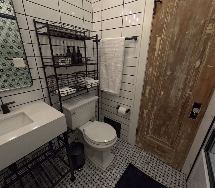 Beautifully remodeled Jack & Jill style bathroom with a fresh classic look & soft water shower.