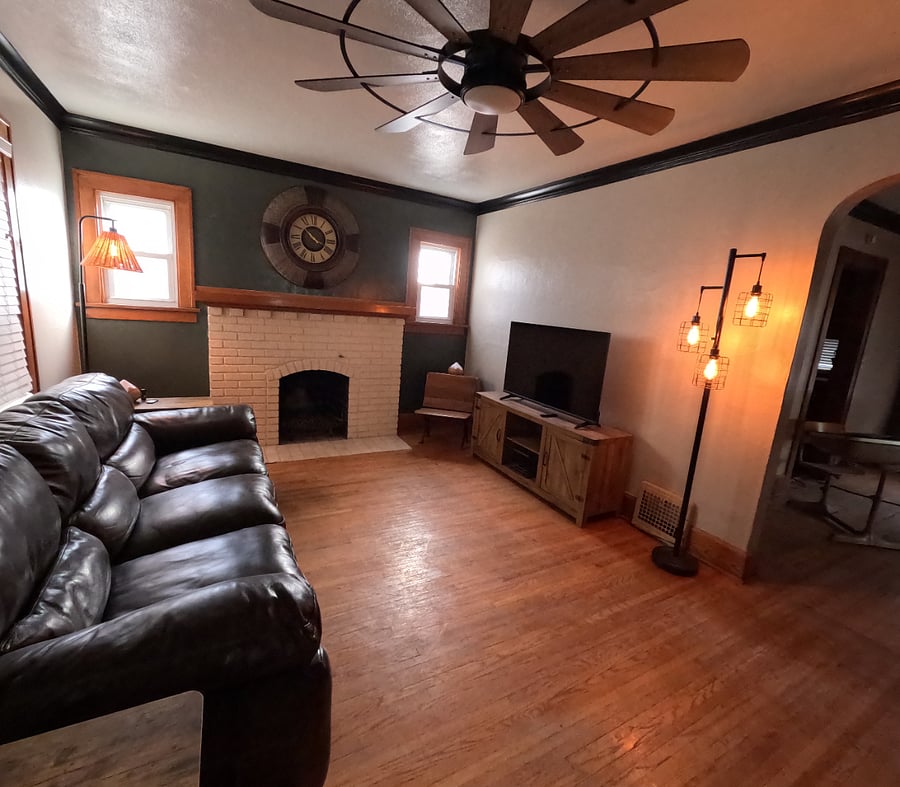 "Cozy & Clean" updated living room with fireplace & 50" Fire TV