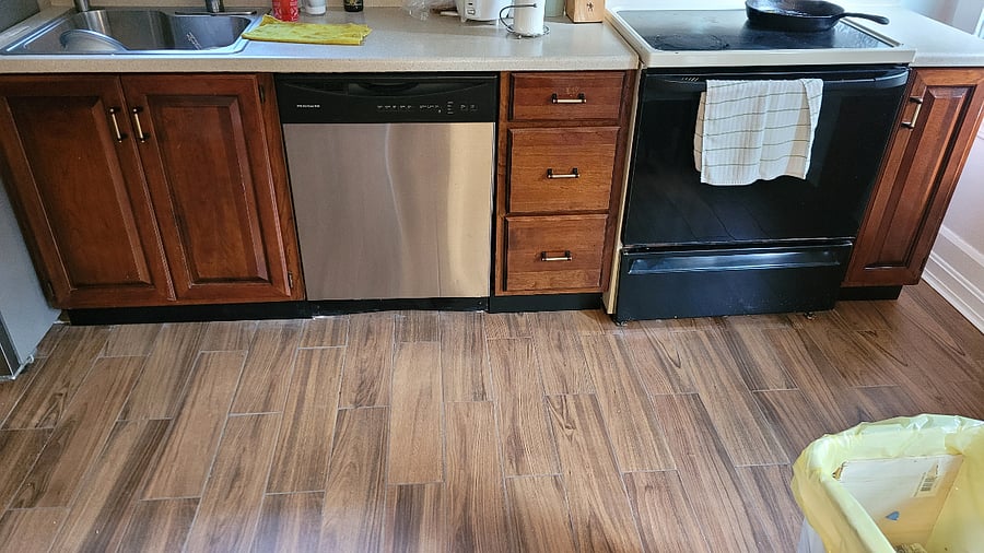 Kitchen with new, porcelain floorBedroom