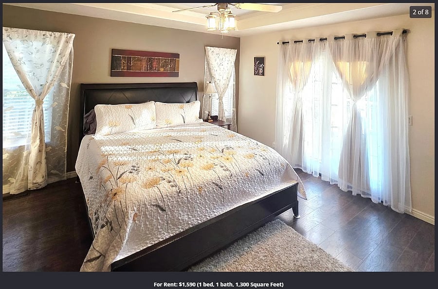 The bedroom has a king size bed, flat screen TV, ceiling fan, and walk in master closet.