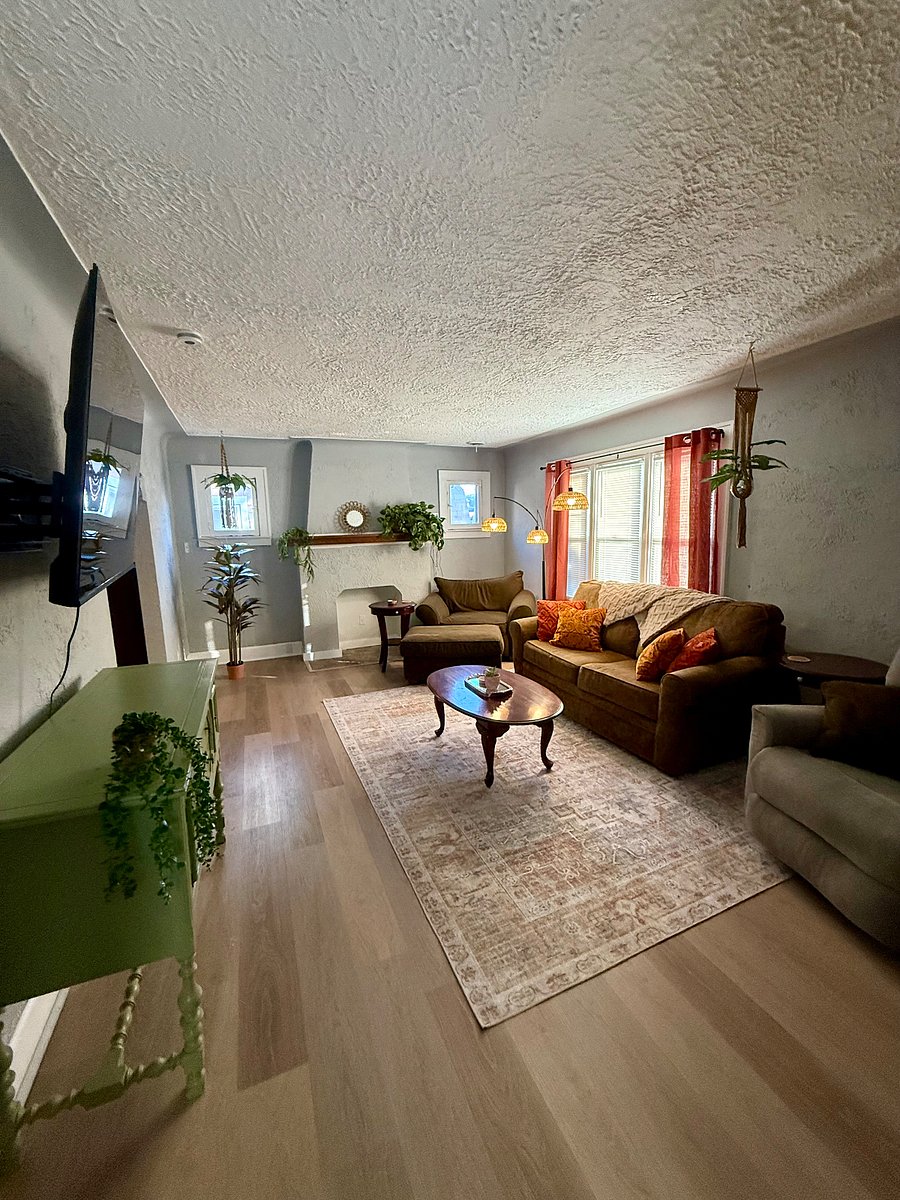 Living room with sleeper sofa and new 58 inch Roku smart TV
