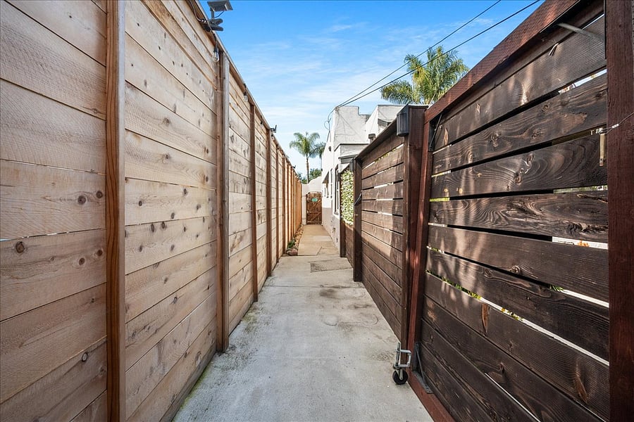 Private walk way leading into private yard for studio.