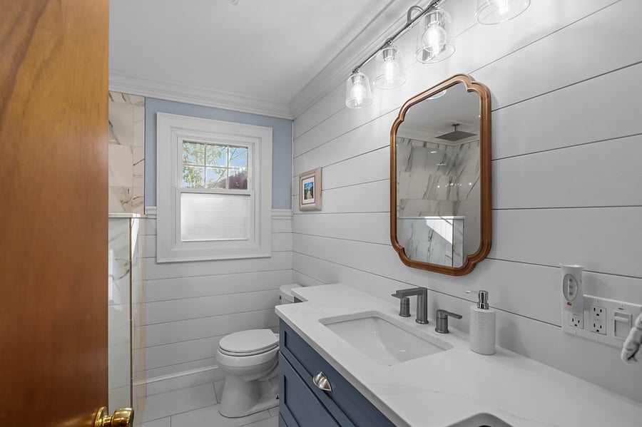 Downstairs full bathroom w/ walk in shower