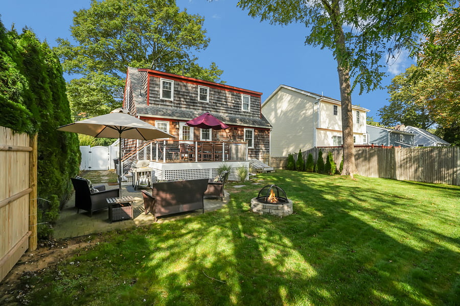 Outdoor oasis with grill, fire pit, and outdoor seating