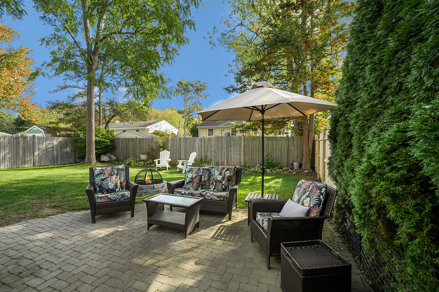 Outdoor oasis with grill, fire pit, and outdoor seating