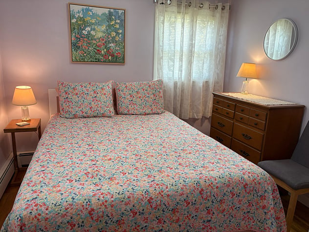 Guest bedroom with queen-sized bed