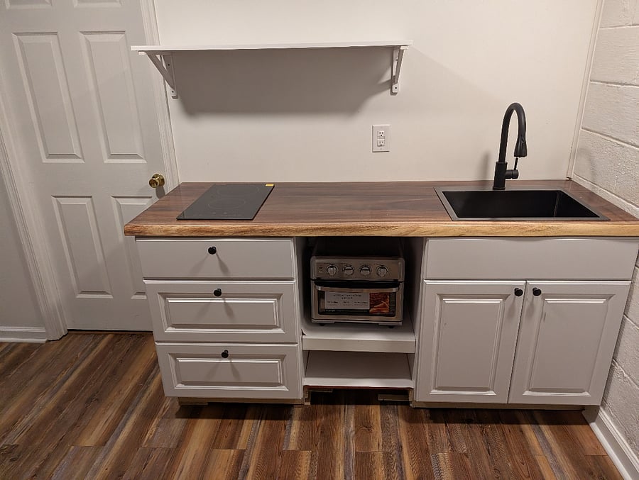 kitchenette with door to laundry