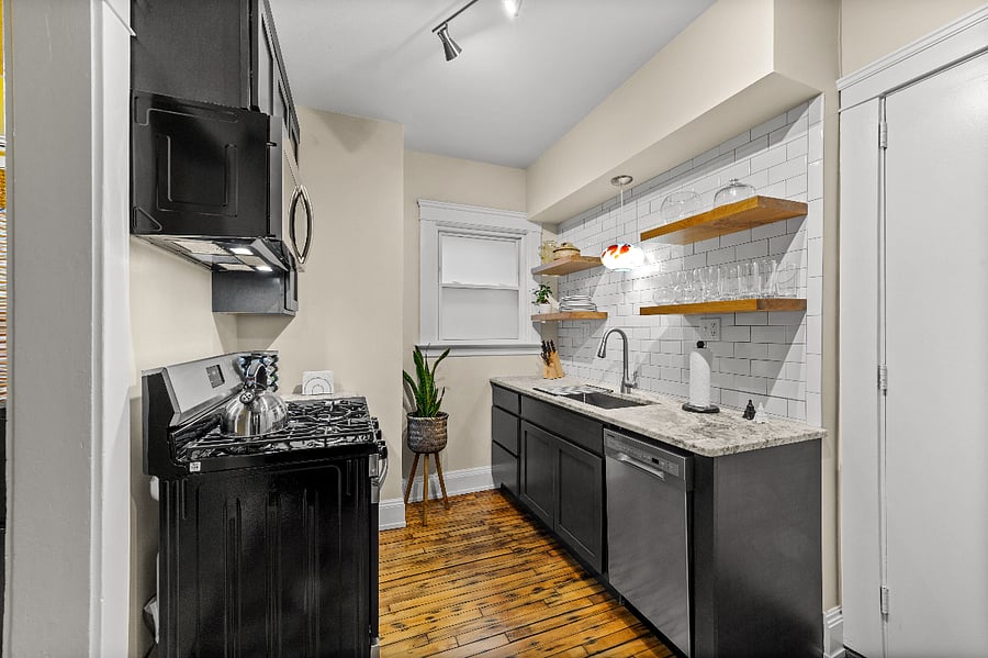 Brand new kitchen with leather finish countertops