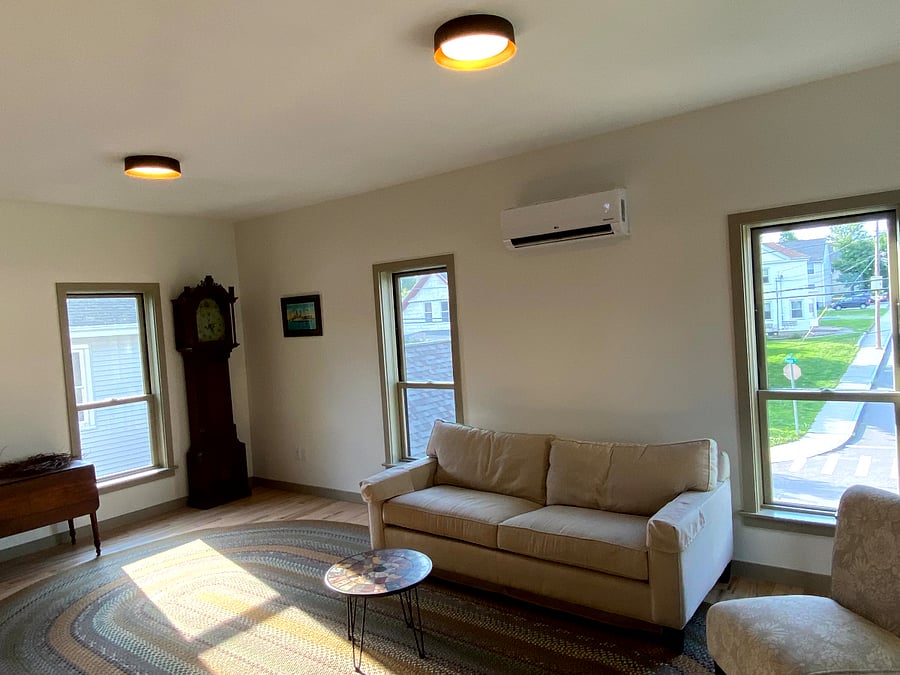 Study inclusive of a private work space and and pull out couch.