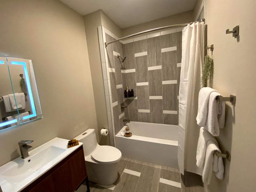 1st floor full bathroom with a bath tub.