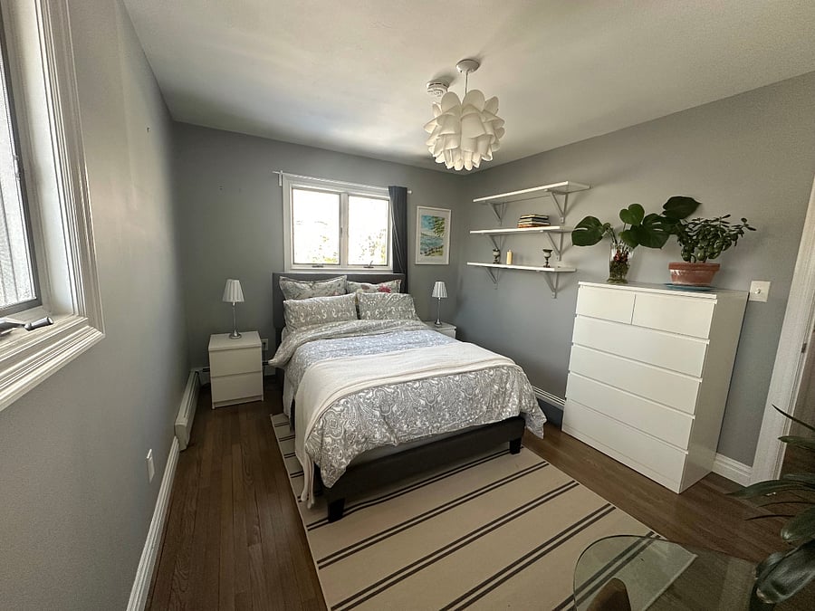 Bedroom #2  has one small closet, one six drawer dresser, two bedside tables. Smoke alarm in bedroom. Sunny, quiet. $1600. for this slightly larger bedroom.