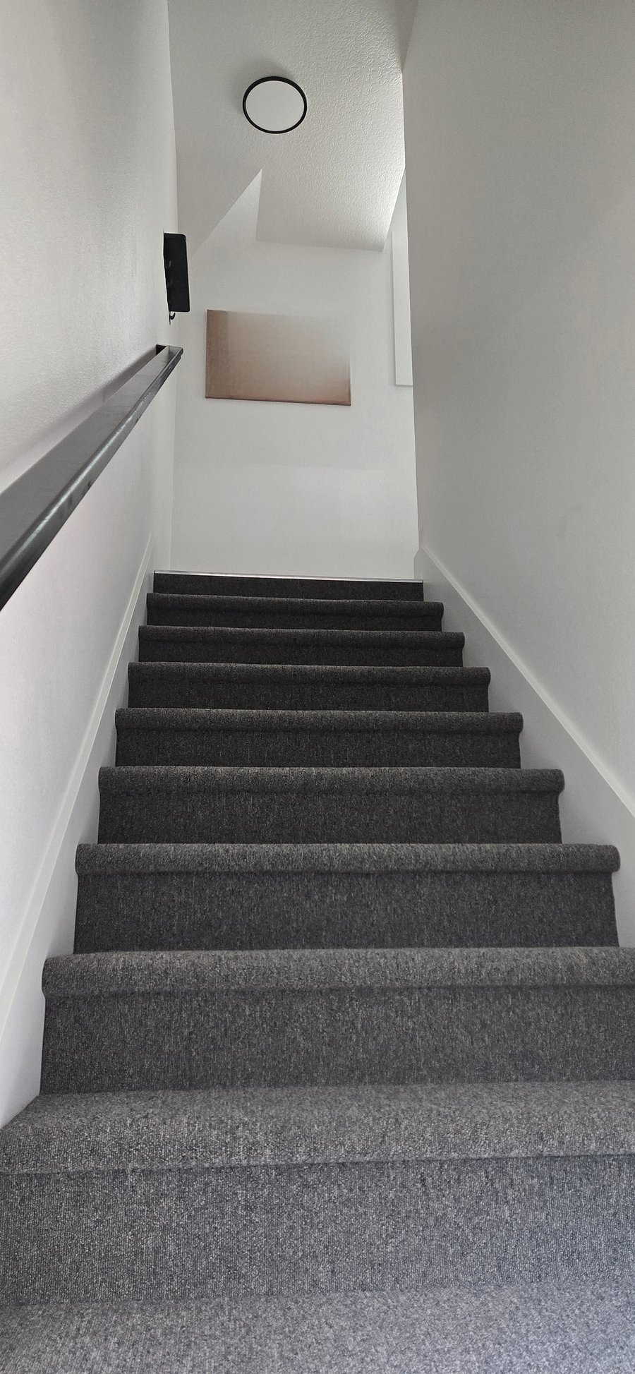 Inside stairs leading up to the studio apartment