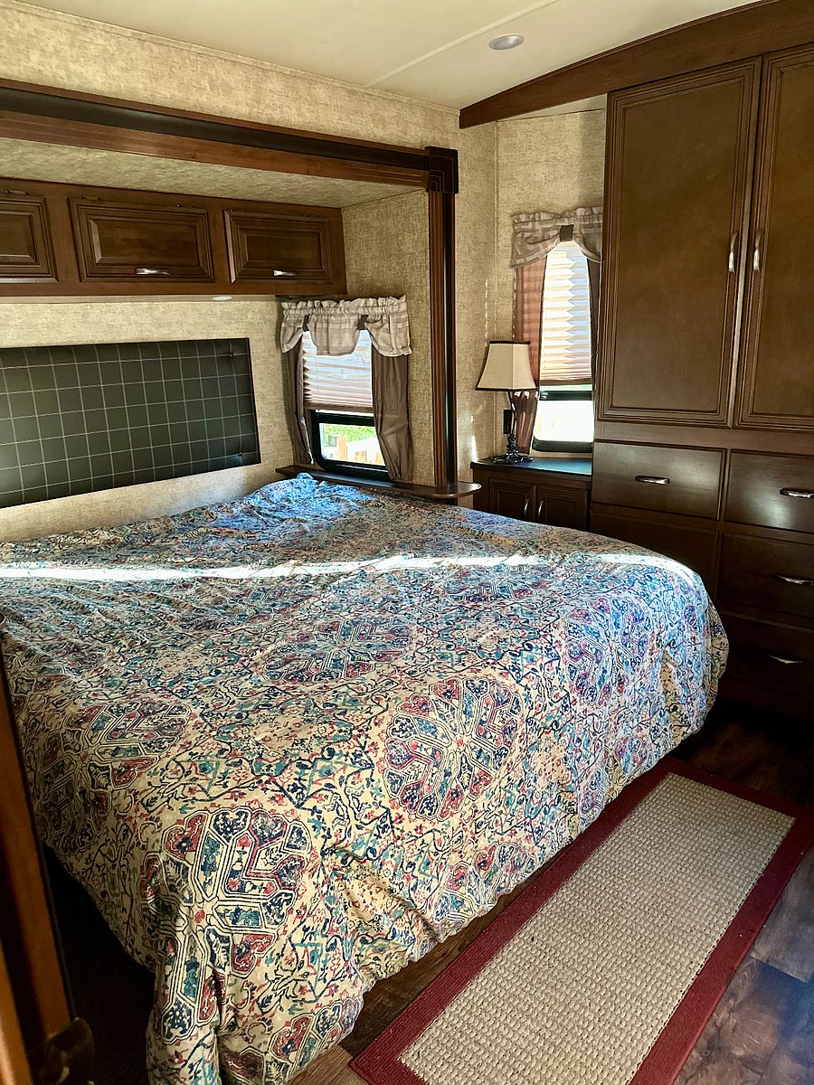 Private bedroom, with RV King, armoire, dresser and closet.
