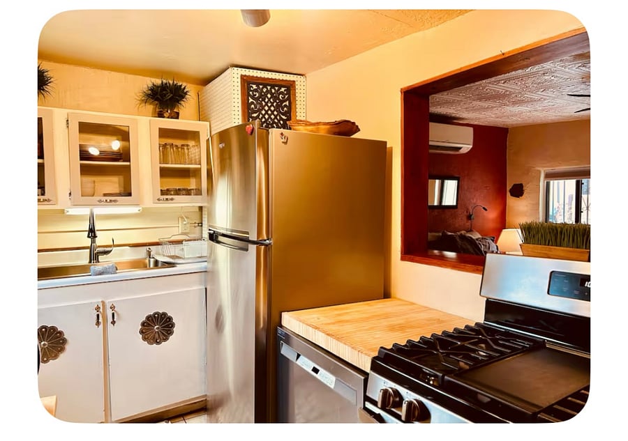All updated appliances include new dishwasher, fridge, oversized sink, and oven. Small but mighty kitchen!