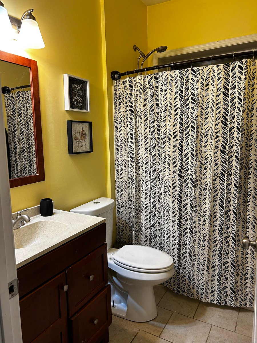 Downstairs bathroom next to bedroom