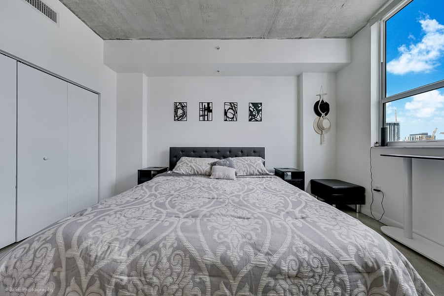 Modern Downtown Loft with Balcony, Parking & City Views