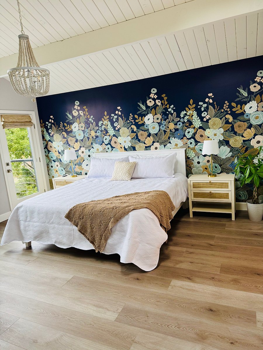 Escape to your stunning master suite with a dreamy 14" plush King-size mattress, a private deck, sitting area, workspace, en-suite bath with rain shower, and a walk-in closet