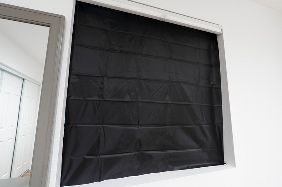Black out curtain easily installed or removed with magnets that are already in place on window.