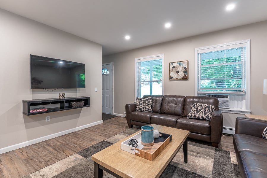 Living Room with Roku Wall Mounted Smart TV