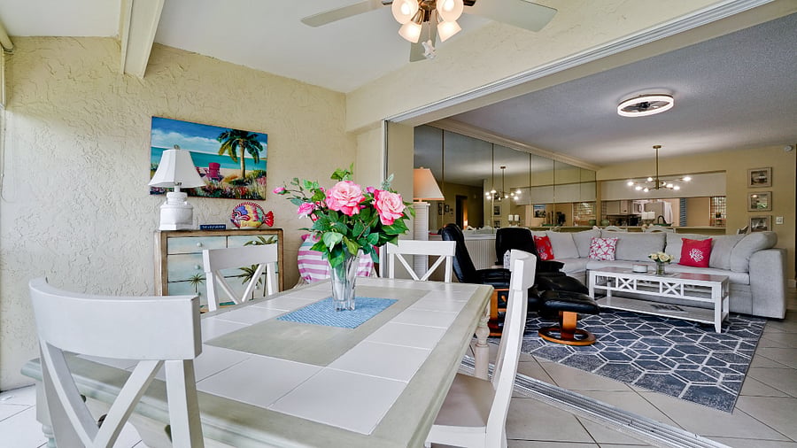 Table on screened in porch provided for work or play!