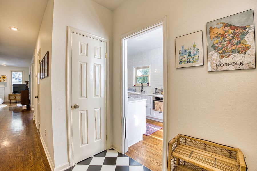 The view walking in the door.  The  kitchen is off to the right and the  1/2 bath is to the left side of the closet down the hall.